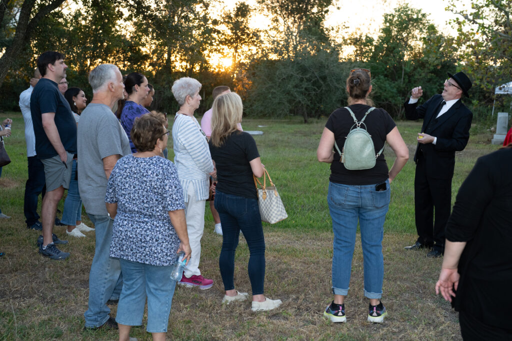 Performance still from Hops and History 2024 at the Old Settlers Cemetery in Pearland