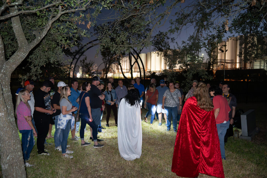 Nighttime tour of Old Settlers Cemetery in Pearland during Hops and History event